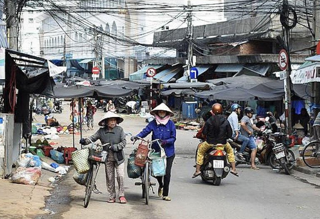 为何越南街头放着成捆人民币导游提示小心吃大亏