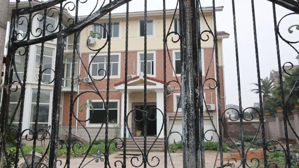 吴英父亲的十年:借300万打官司 现在像祥林嫂(图)