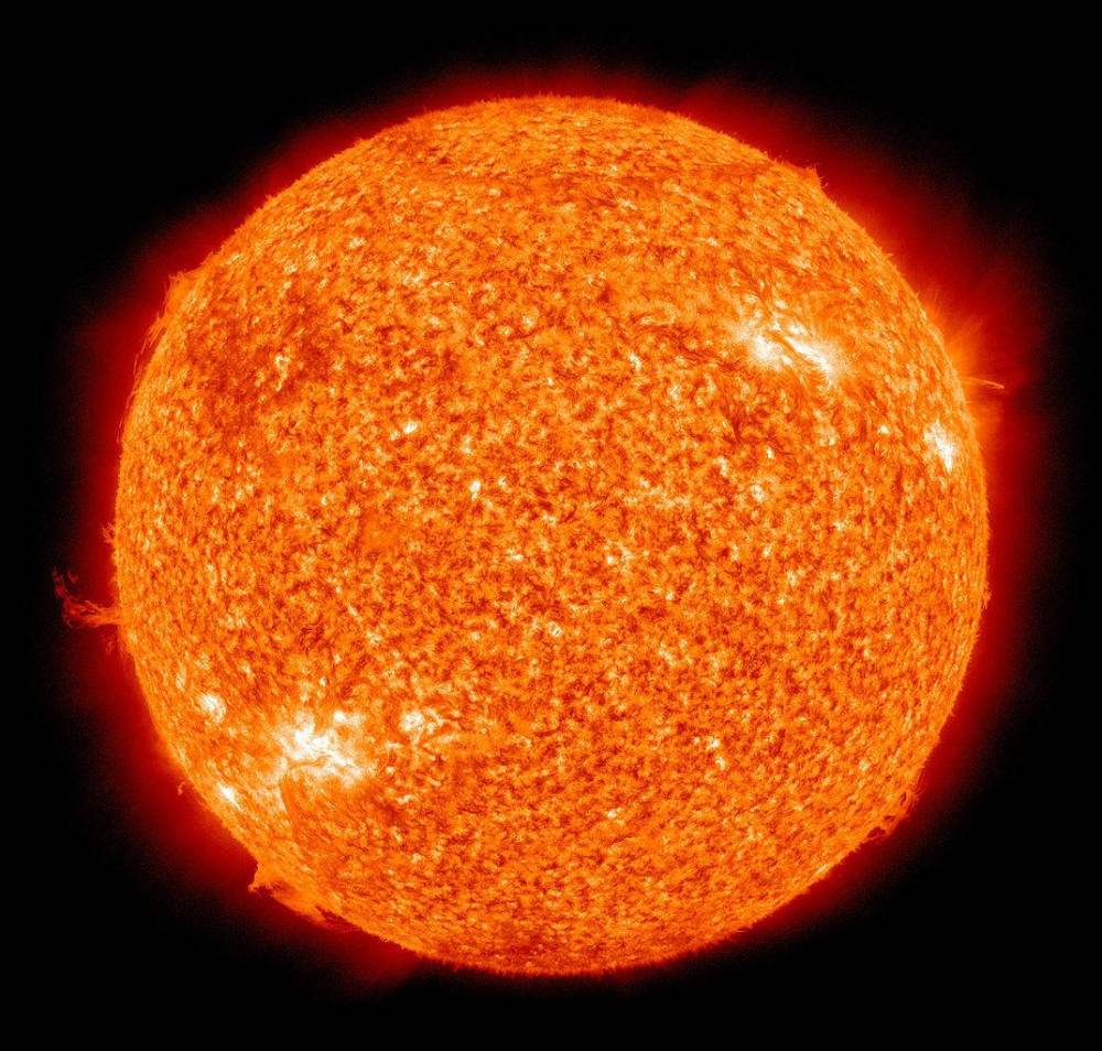 图解:在极紫外区观测得到的太阳的伪彩色照片.