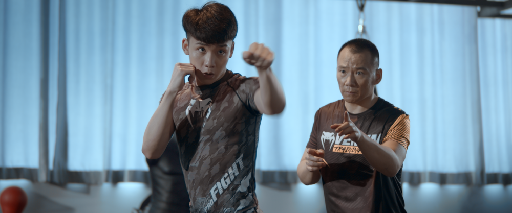 电影《搏击者》以爱为引,格斗元素贯穿全片,以男主阿超(谢浩杰饰)和