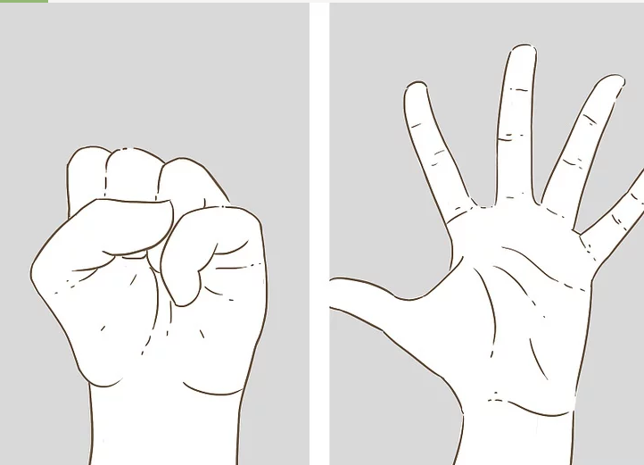手指伸展运动 一手握拳 慢慢地松开攥着拳头的手.