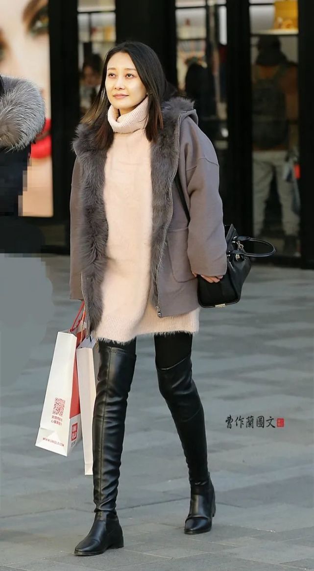 街拍:穿出高级感的真皮高筒靴美女