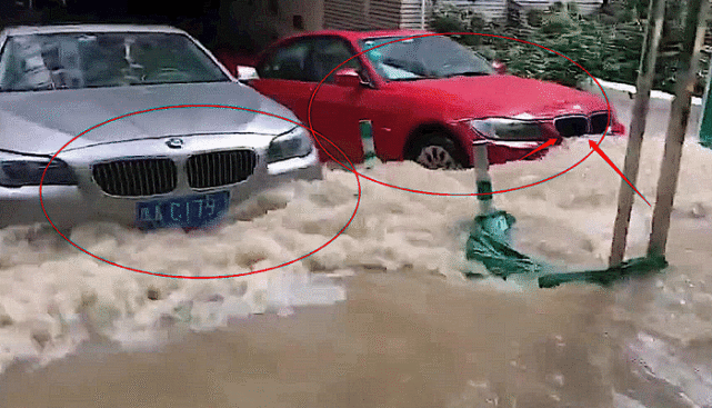 这可能是广州最倔强宝马车,车库门口被暴雨淹,就是不进去