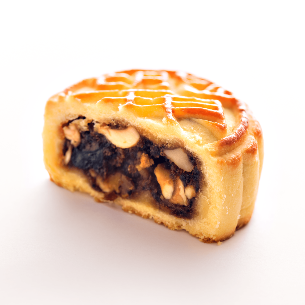 今年推出的松露黑毛猪果仁月饼,以油脂分布平均的西班牙黑毛猪火腿配