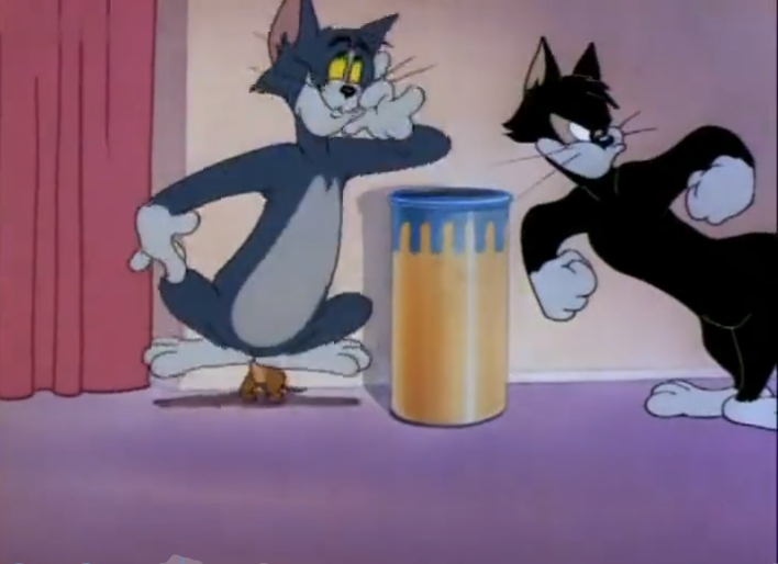 猫和老鼠:汤姆正跟黑猫说没见到杰瑞,结果自己就露馅了:被杰瑞举起来