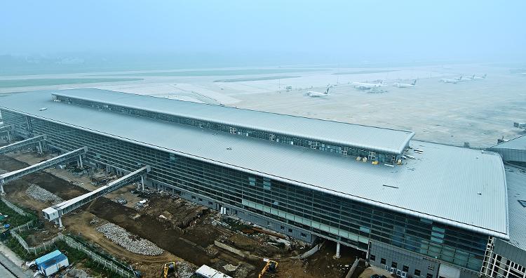 济南机场北指廊工程主体结构施工完工 预计年底投入使用