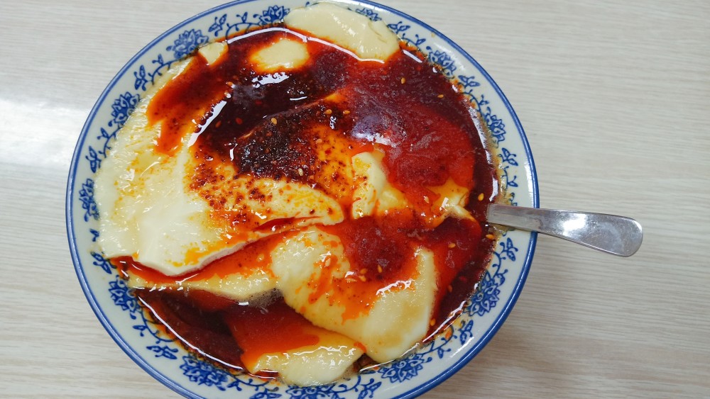 乾县豆腐脑口感滑嫩,酸酸辣辣的,很过瘾