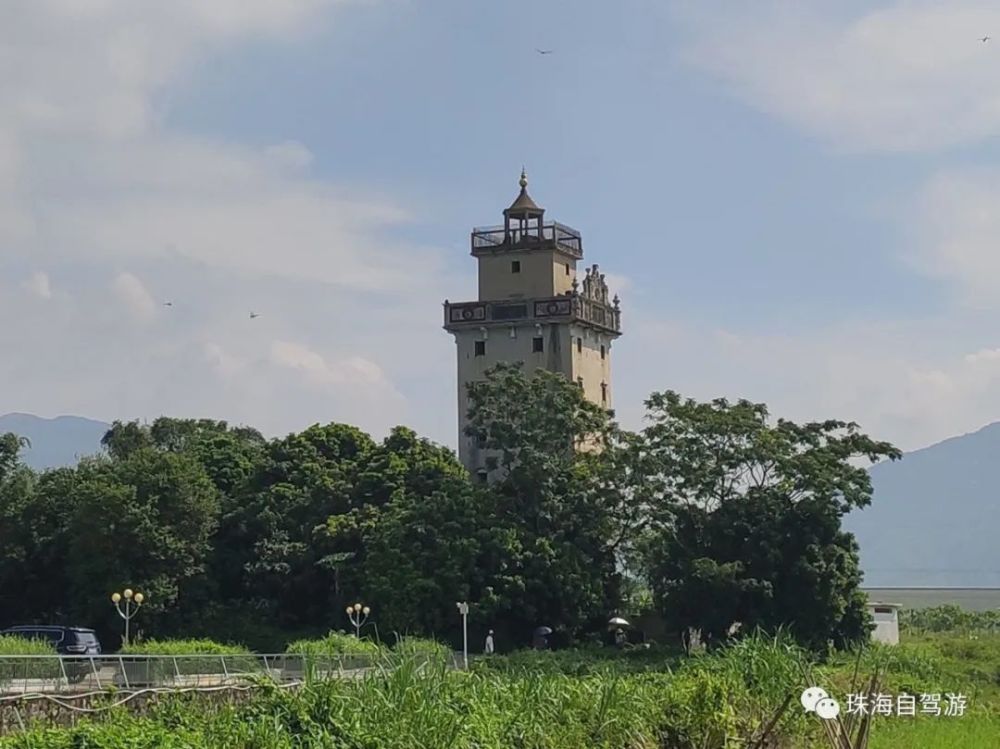 寻台山碉楼,访梅家大院,登顶风车山