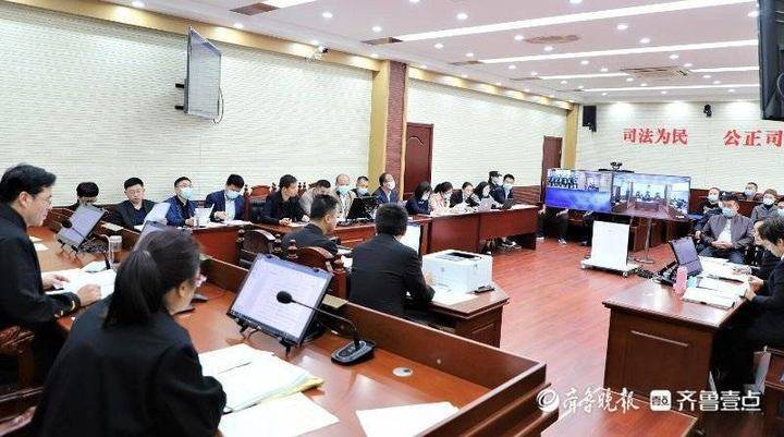 10月20日上午,山东省聊城市东昌府区人民法院对被告人唐金文等29人黑