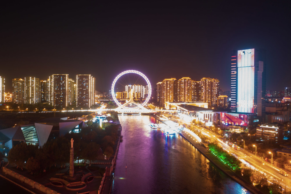 航拍天津城市夜景,海河两岸高楼大厦灯光璀璨