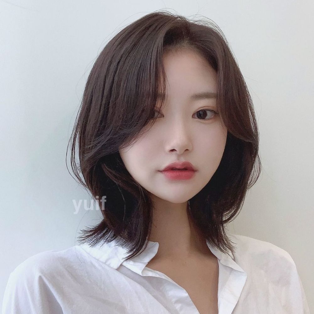 中长发的女性选择这种内扣的造型也是很不错的 ,温柔时尚不老气