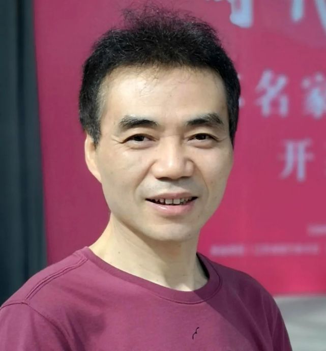 南京集庆门春联书写者常汉平"城门挂春联"是历史与现代的融合