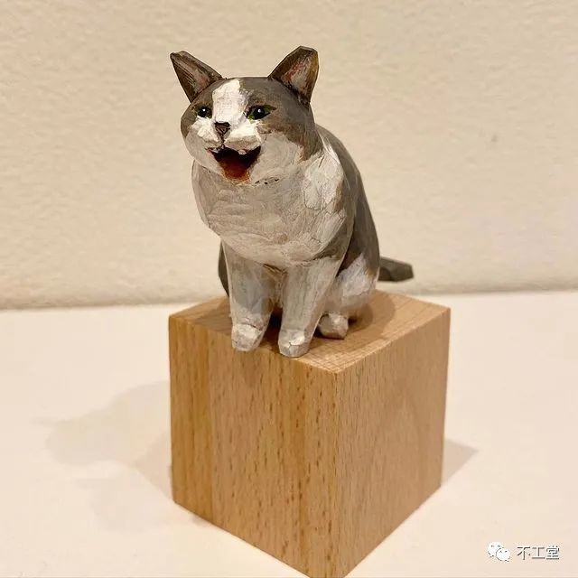 让人不禁想撸的木雕小猫咪