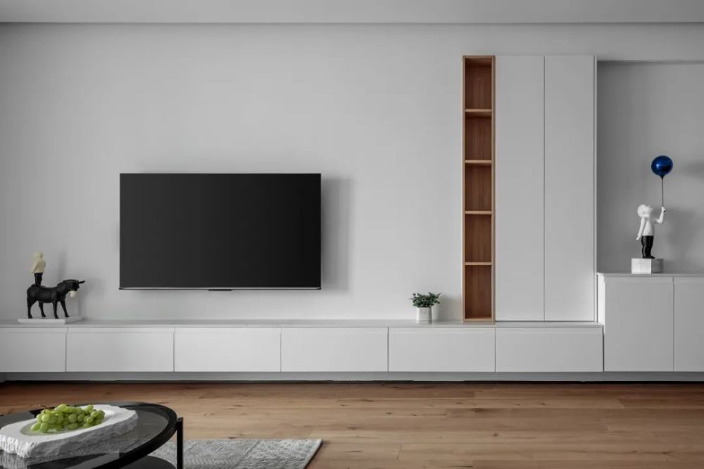 客厅之间没有墙体,呈长条形分布,同样可以做相连的一字形玄关柜 电视