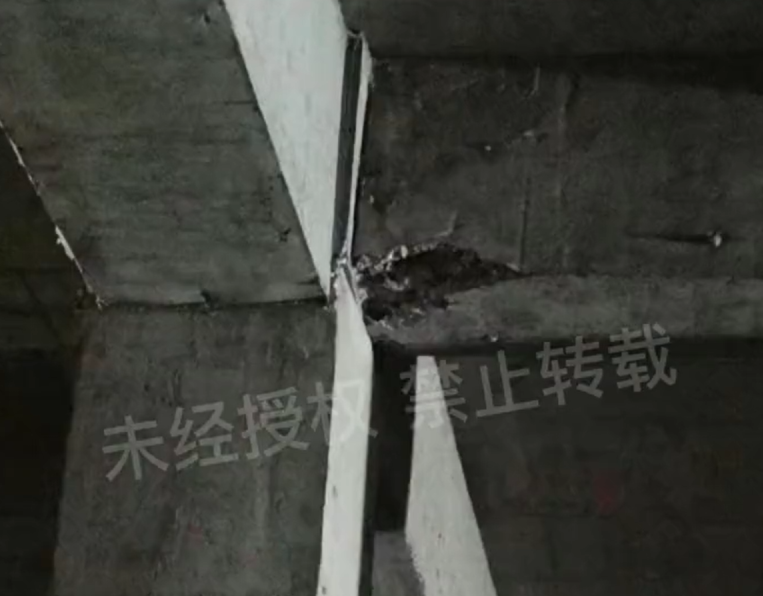 潍坊绿地城小区地下车库楼板开裂,柱子扭曲 工程质量引担忧