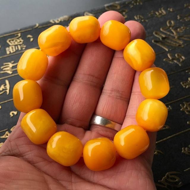 为什么文玩市场上,烤色密度比天然蜜蜡贵?