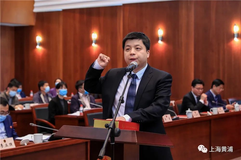 区人大常委会会议审议环保三年行动计划,决定任命王鼐