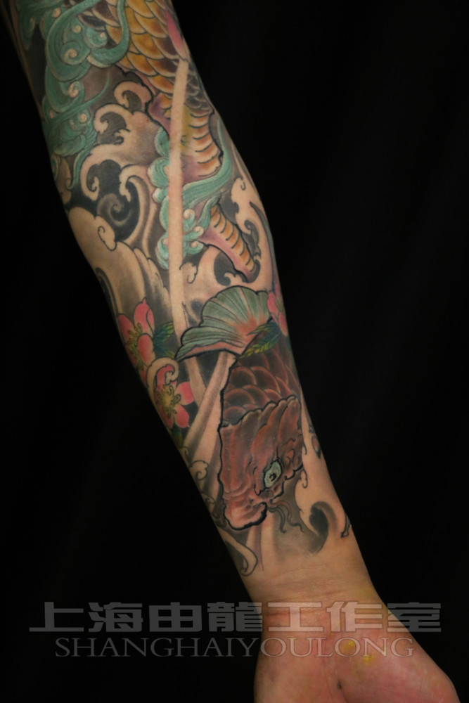 由龙纹身设计的花臂麒麟纹身图案