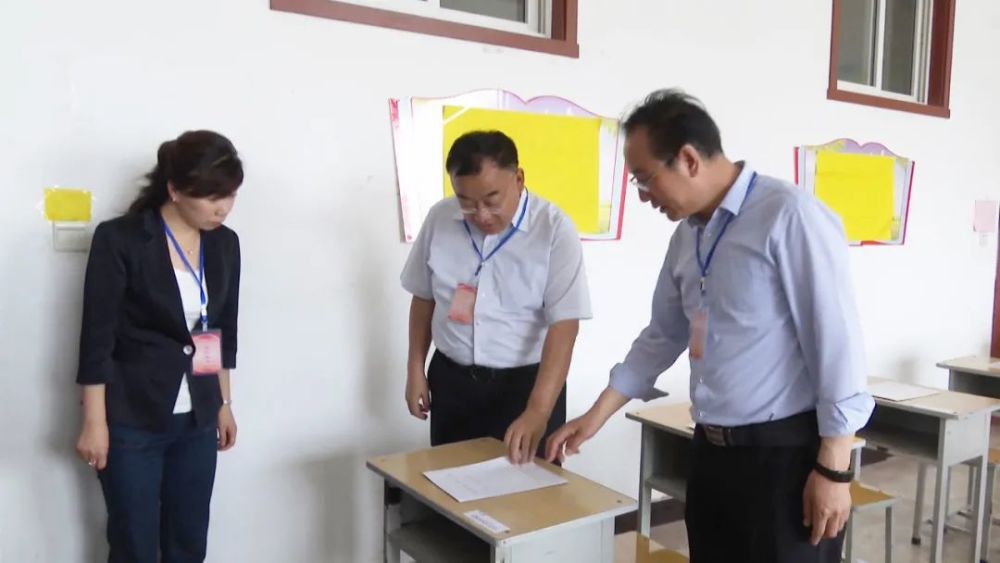 政府副县长白妍及县委办,县教科局负责人参加.
