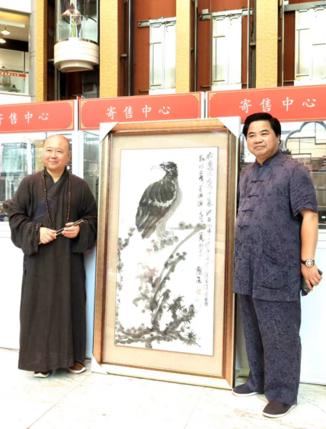 当代著名画鹰国画大师朱祖国与上海玉佛寺方丈觉醒的墨韵禅心