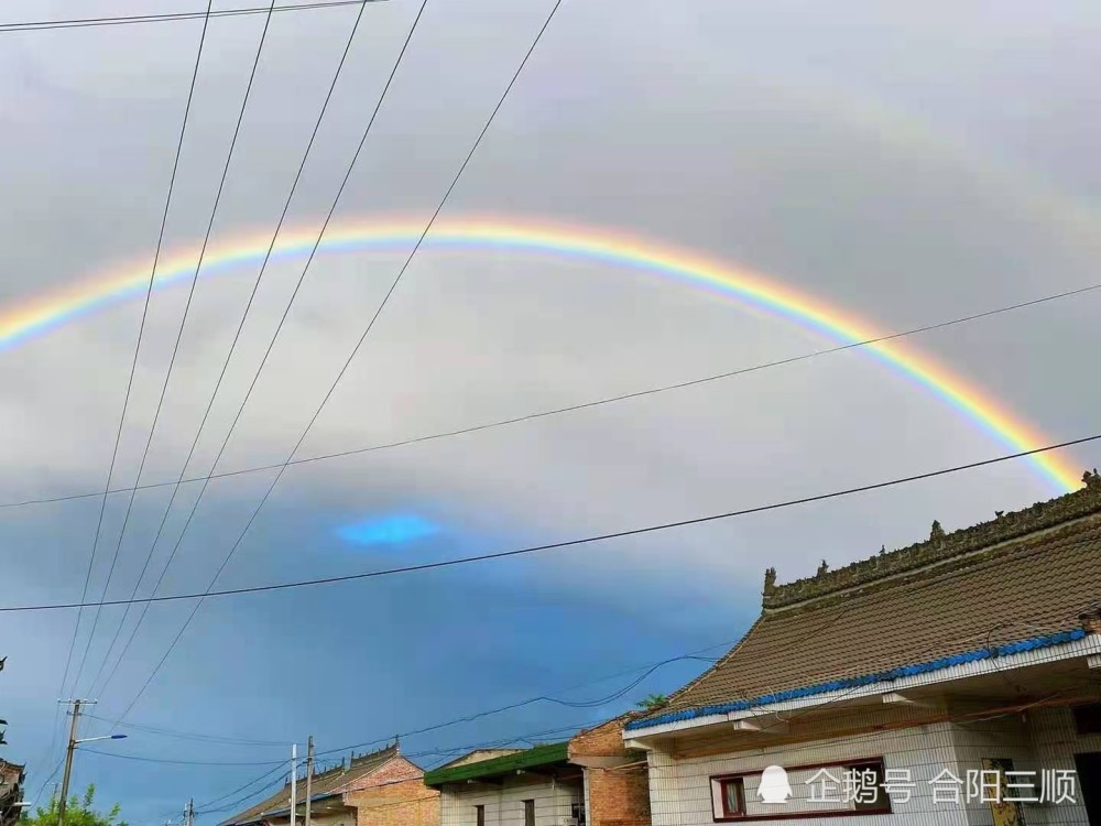 夕阳见证雨后彩虹