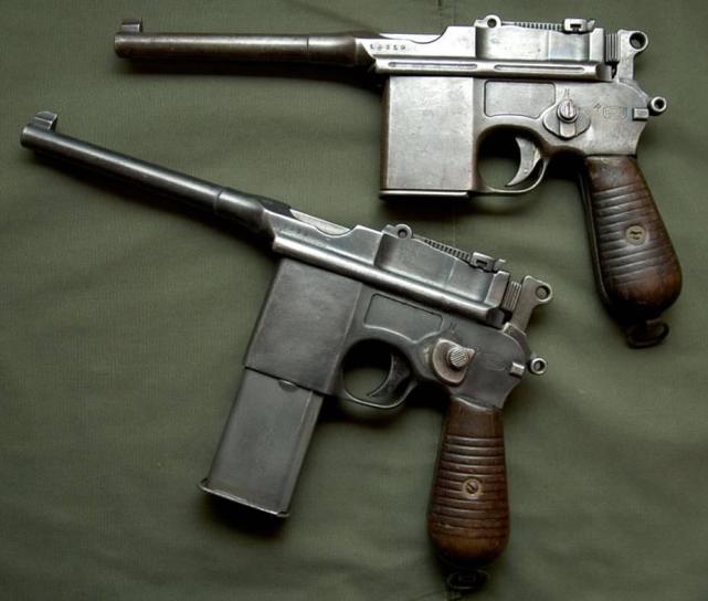 安装两款不同弹匣的毛瑟m1932速射型手枪.