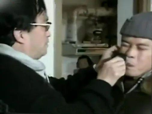 谢晋于阿四