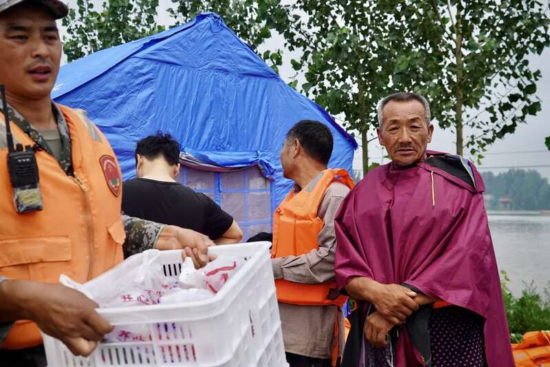 直击河南卫辉村庄救灾三千多名受灾群众已脱困转移