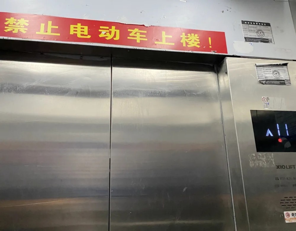 如何防止电动车进电梯上楼?