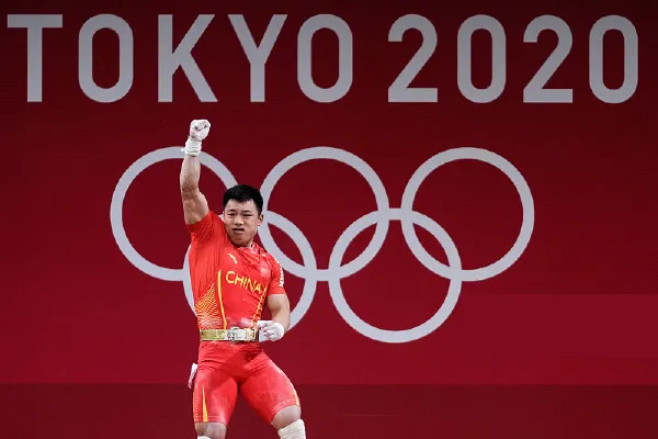 举重若什么成语_举重卡通图片(4)