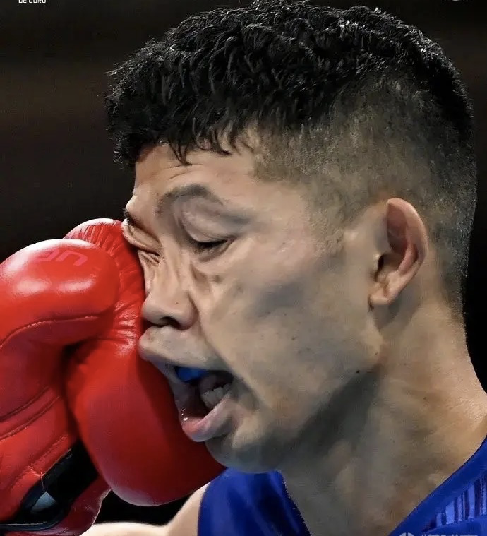 日本拳手上台挨揍却晋级,乒乓男团晋级决赛,对手问怎么能赢他们