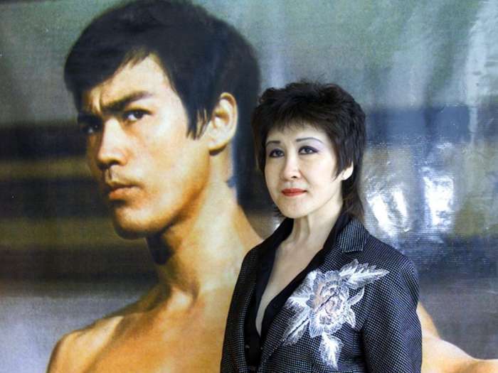 丁佩:香港名媛,李小龙的红颜知己,被前夫向华强供养40年_腾讯新闻