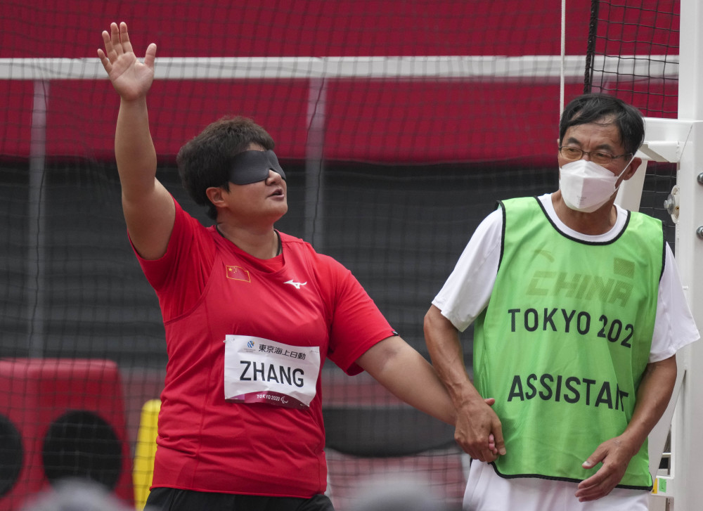 (东京残奥会)田径——女子铁饼f11级决赛:张亮敏夺冠并刷新世界纪录