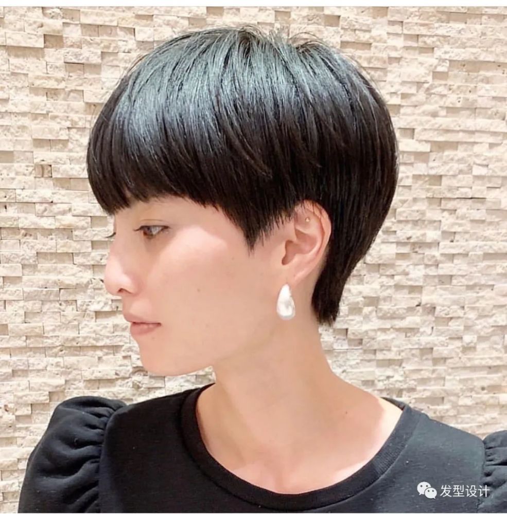 精致女孩的精致短发.