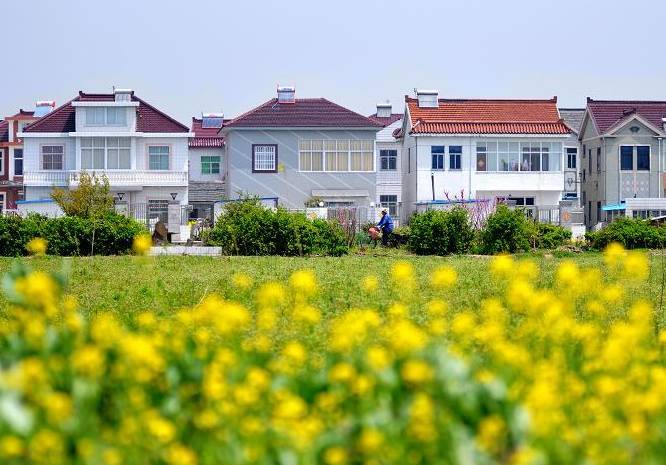 镇江的一个富裕县级市,人均收入近5万元,农村别墅特色