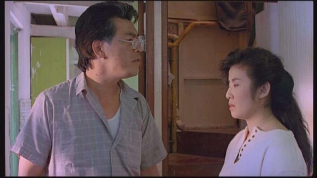 1990年和周星驰,吴君如主演的《望夫成龙》,成奎安一改之前黑社会