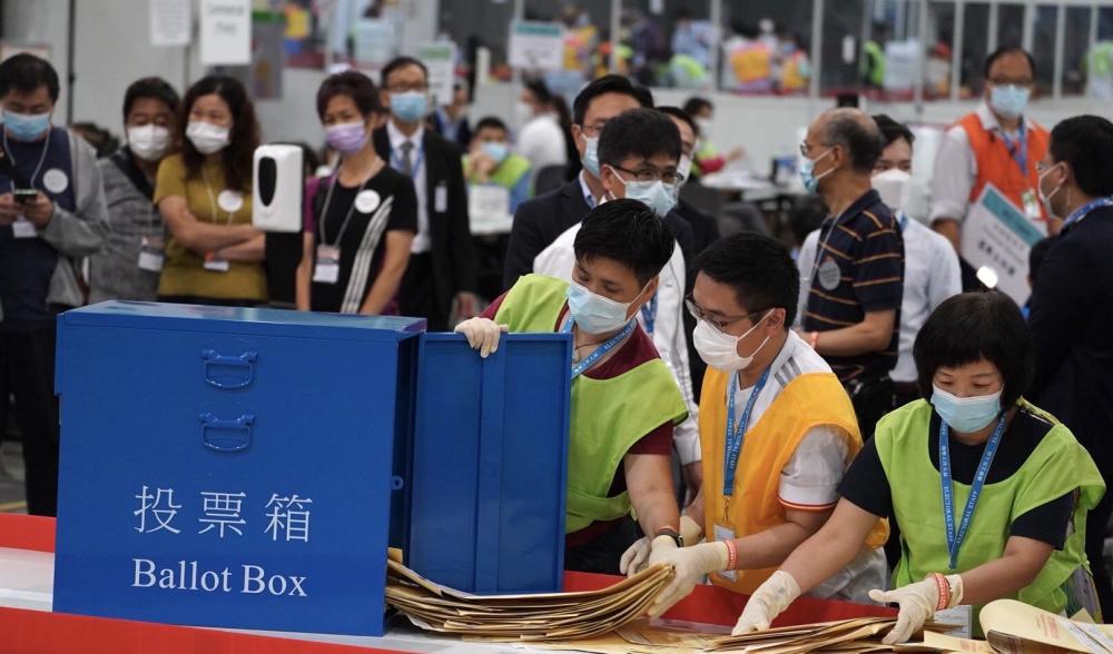 香港特别行政区选举委员会选举顺利举行展现新气象新希望