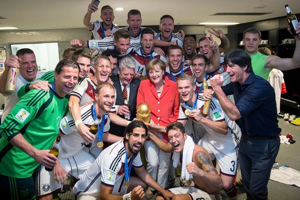 2014年7月13日,巴西里约热内卢,世界杯德国队夺冠,默克尔和时任德国