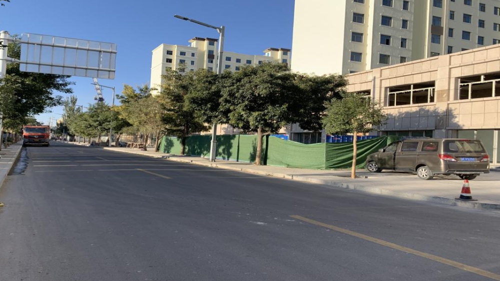 整改后 5 玉门荣鑫城市花园建设项目建筑工地围挡宣传标语脱落 整改后