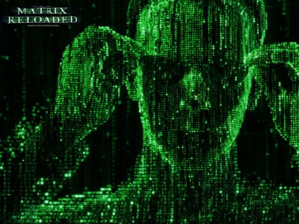 有一个超越时代的著名系列电影《黑客帝国》(the matrix)