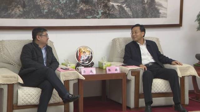 山东邹平张谦会见省金融资产管理公司客人