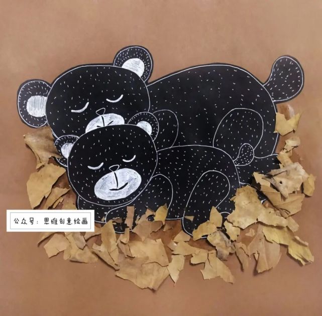 【第一步】用高光笔在黑色卡纸上画上黑熊,并画上黑熊的毛发装饰黑熊
