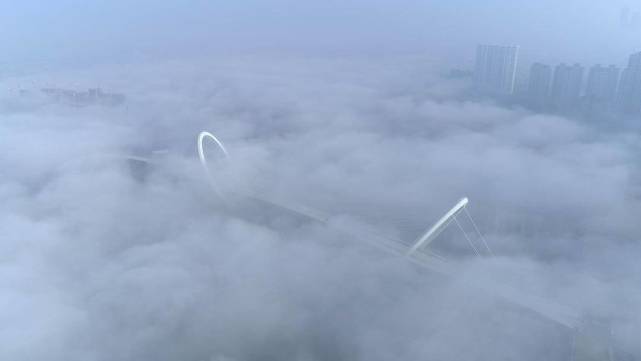 大美江苏 另眼相看｜壮观平流雾，云海中的城市恍若仙境_腾讯新闻