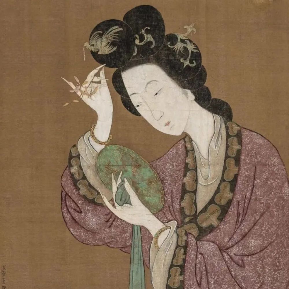 武博学术海兽葡萄纹铭文铜镜赏析