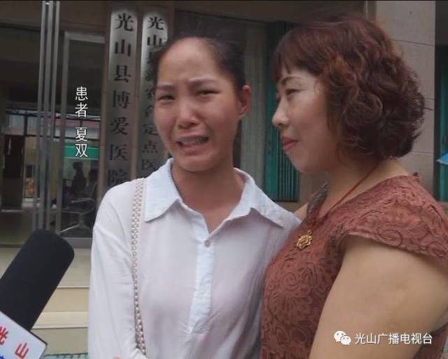 信阳一女子路边中暑突晕倒 好心人毫不犹豫忙施救