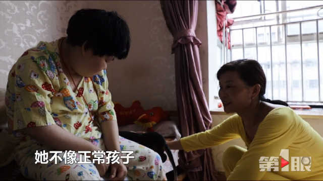重庆女子照顾脑瘫女儿36年 还捐肾救儿子