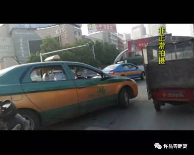 许昌火车站附近出租车"赶早场" 随意停放影响交通