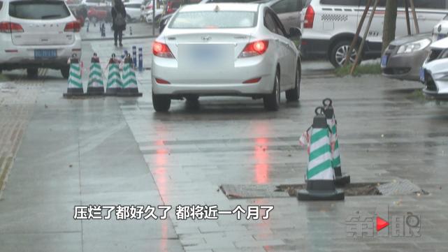 两百米路段现十大洞 过路就像闯关