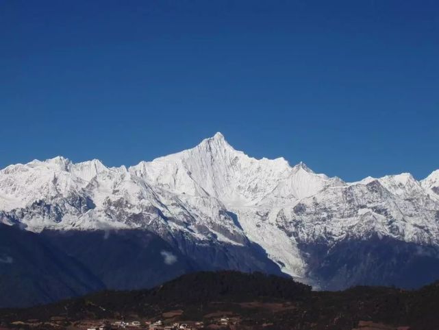 DƬ