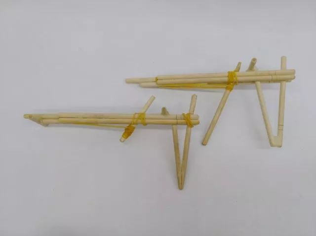 筷子皮筋枪不仅可以做成这种简易的单发装置,还可以挑战连发装置.